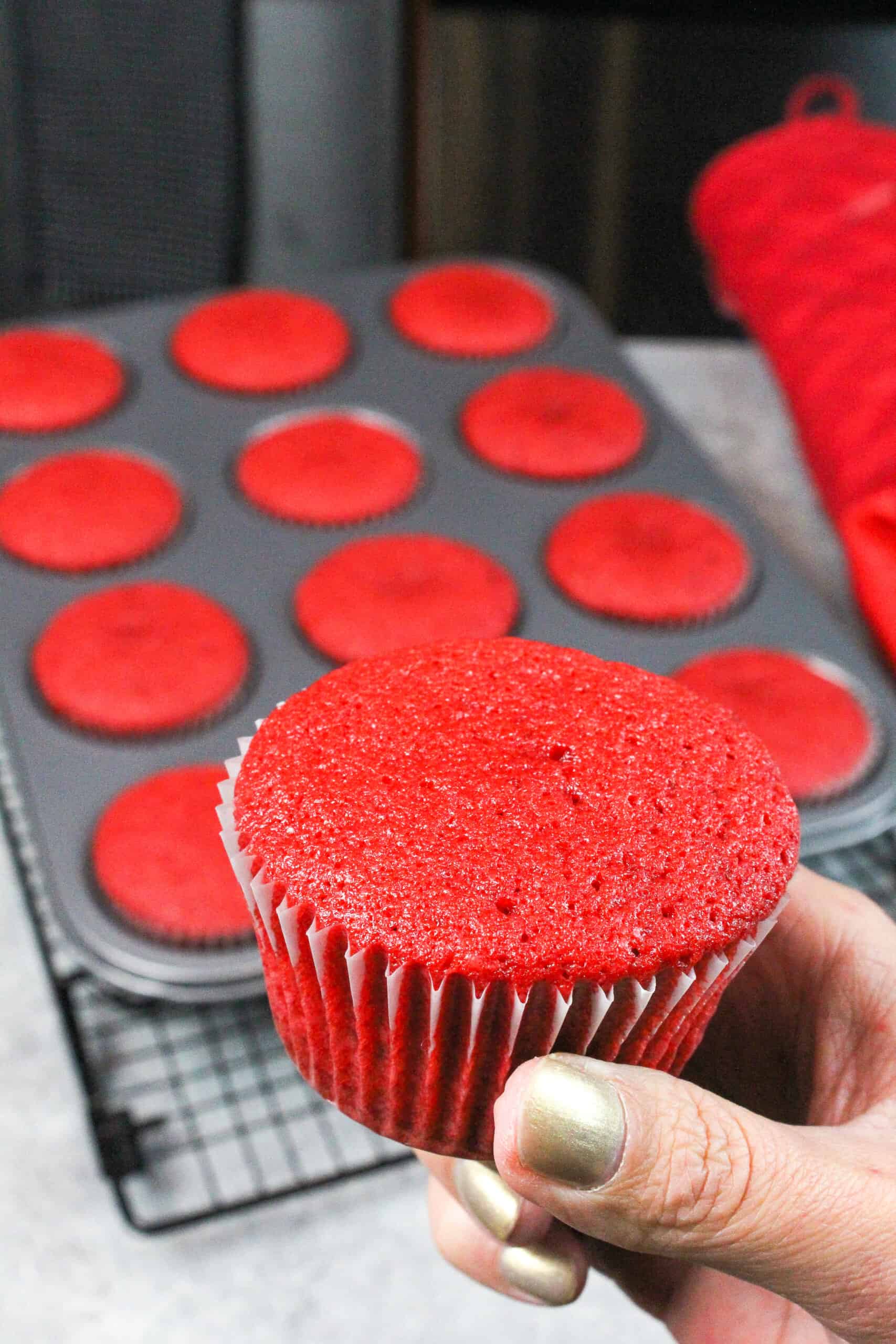 image of bright red, red velvet cupcake