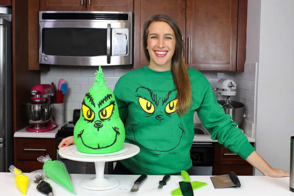 image of chelsey white with grinch cake