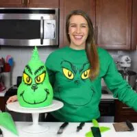 image of chelsey white with grinch cake