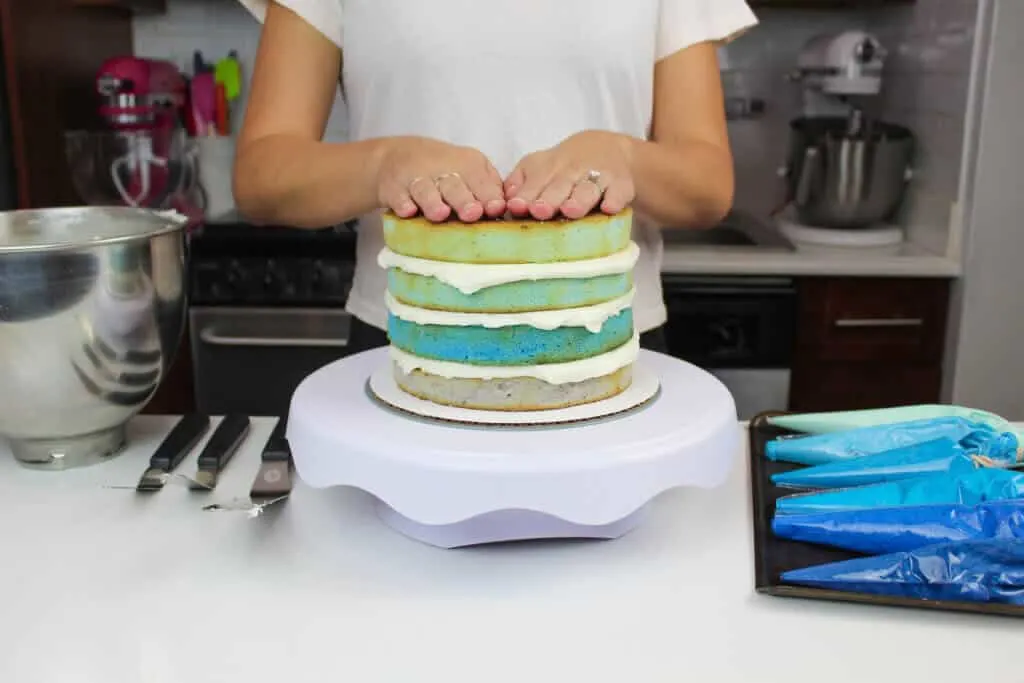 image of stacked blue maple flavored cake layers 
