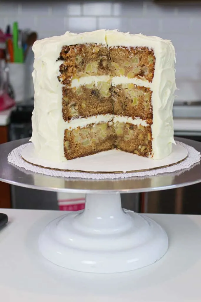 image of frosted old school apple layer cake, frosted with cream cheese frosting