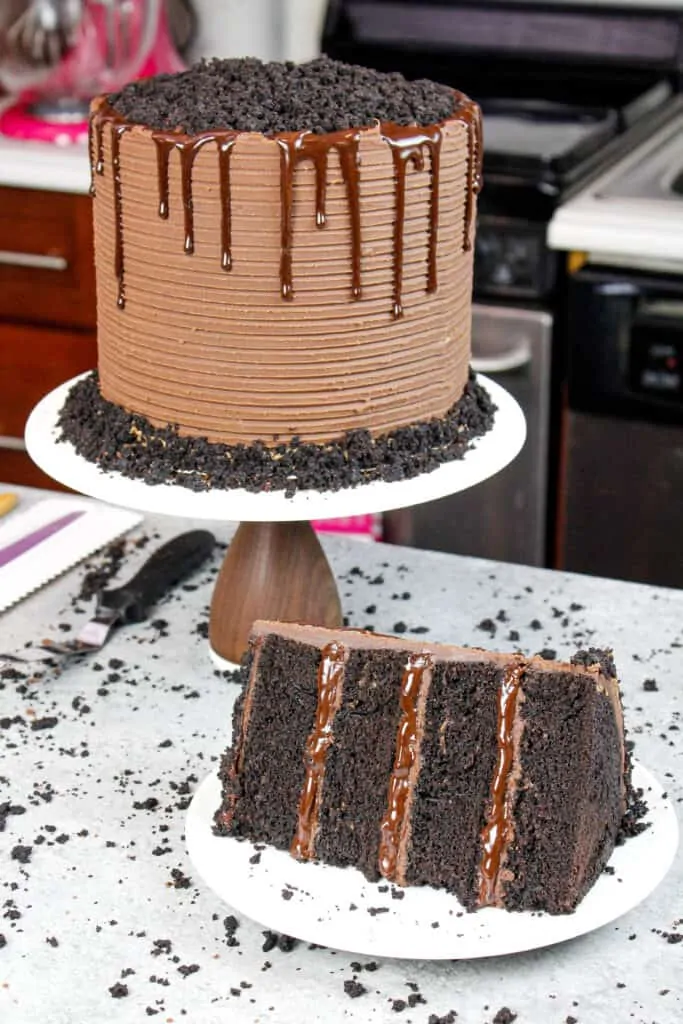 image of chocolate blackout cake, sliced into to show moist chocolate cake layers with pudding and ganache filling