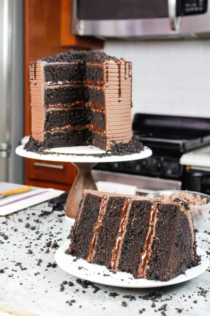 image of sliced open blackout cake with moist chocolate cake layers and chocolate filling