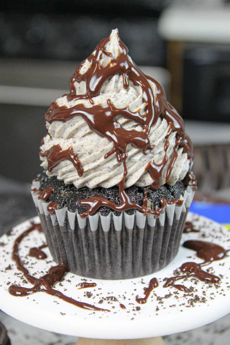 image of oreo cupcake drizzled with chocolate ganache