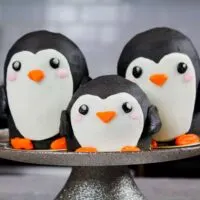 image of penguin cupcakes with baby penguin