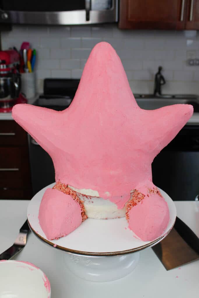 image of smoothed frosting on a sculpted cake