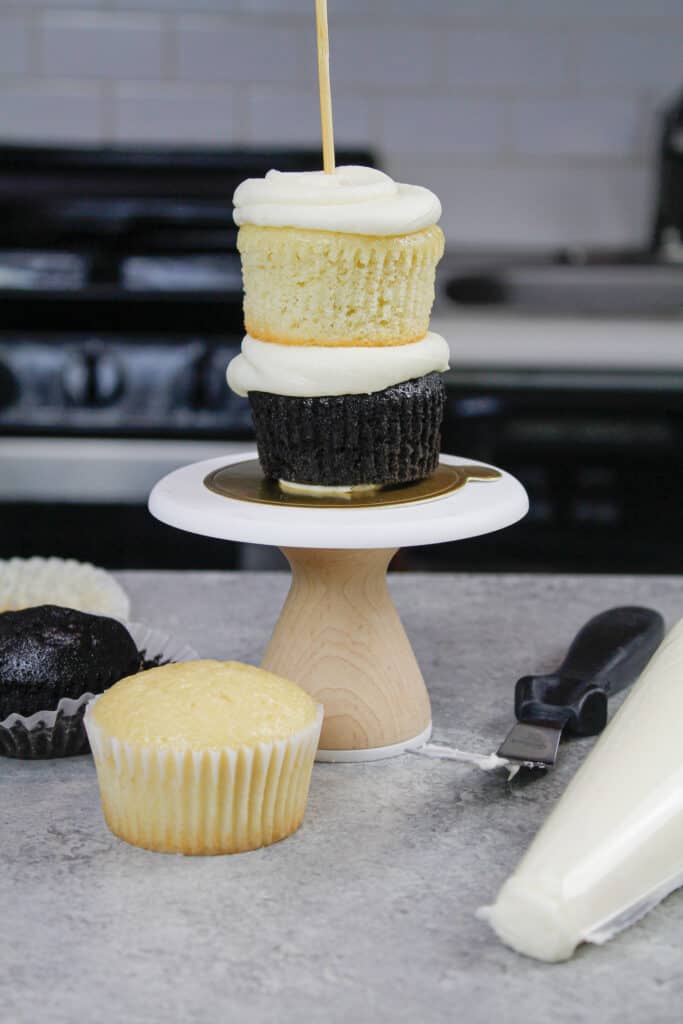 image of stacked cupcakes to make mini penguin cake