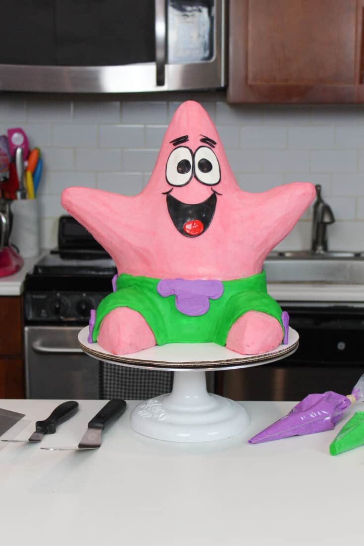 image of Patrick star cake made with strawberry cake layers and frosting