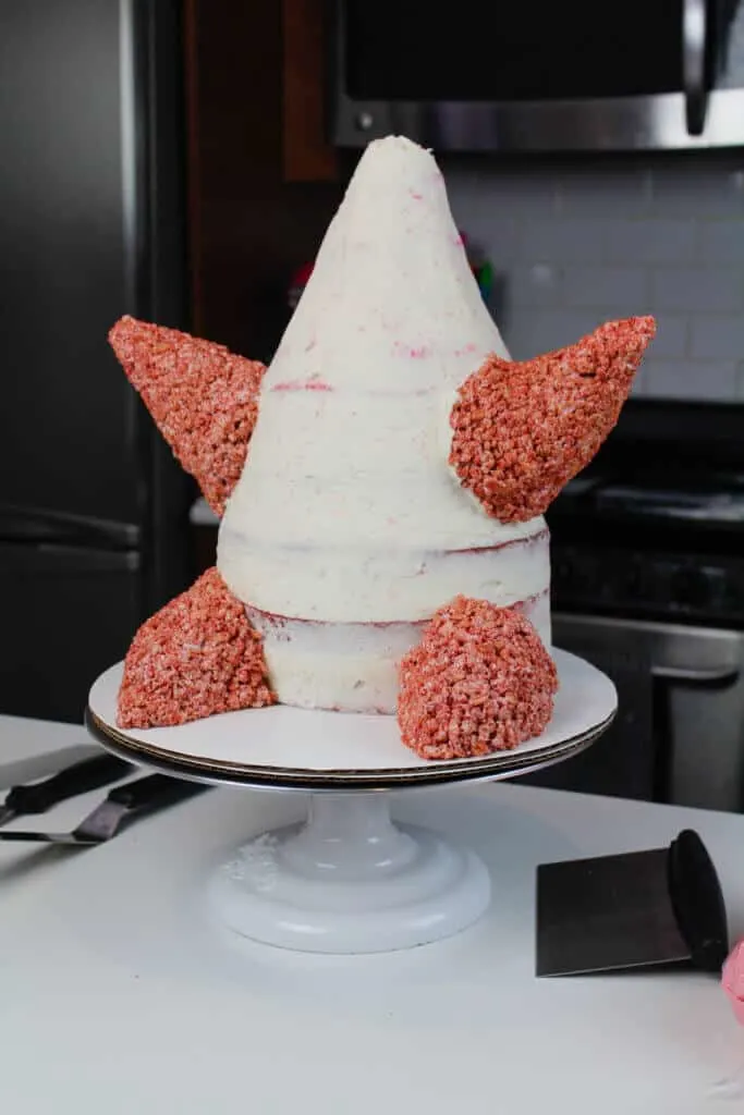 image of cake with rice krispie treat arms and legs