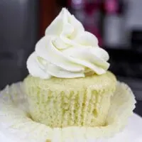 image of a gluten free cupcake, unwrapped to show how fluffy and moist it is