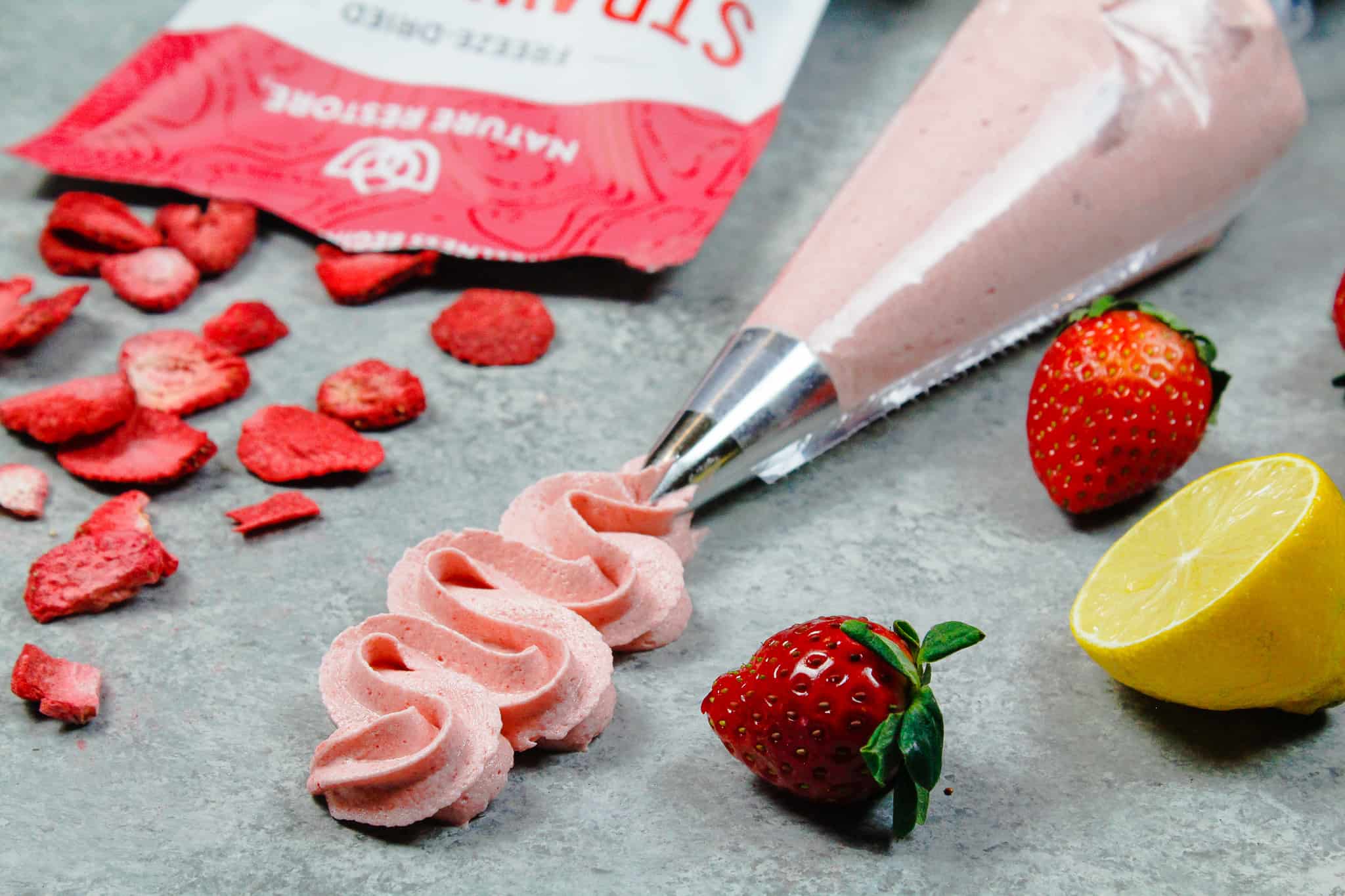 image of strawberry buttercream piped using a wilton 1m frosting tip