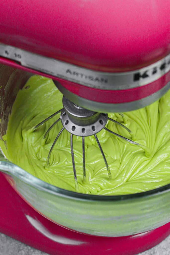 image of matcha cake batter in a kitchen aid