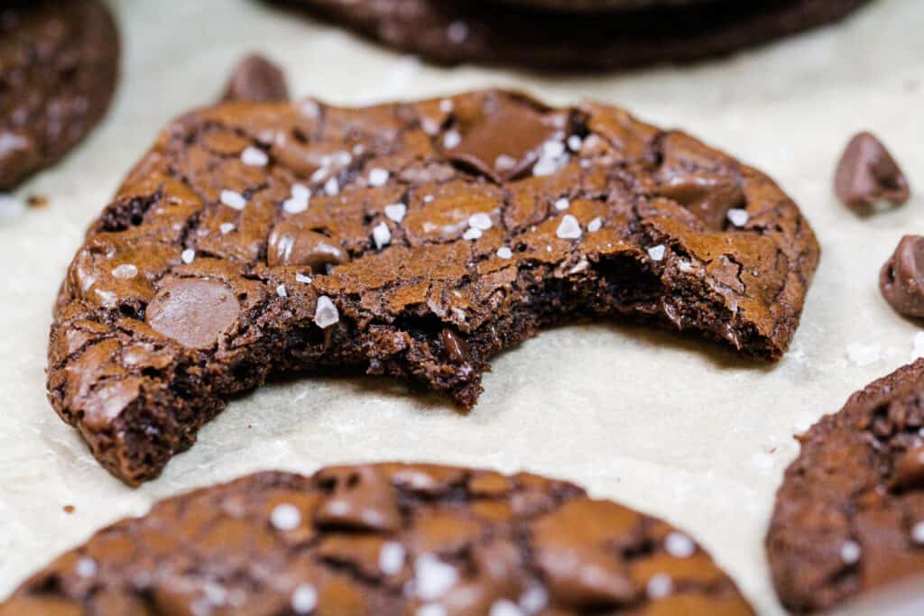 photo of bitten into brownie cookie to show soft and chewy center