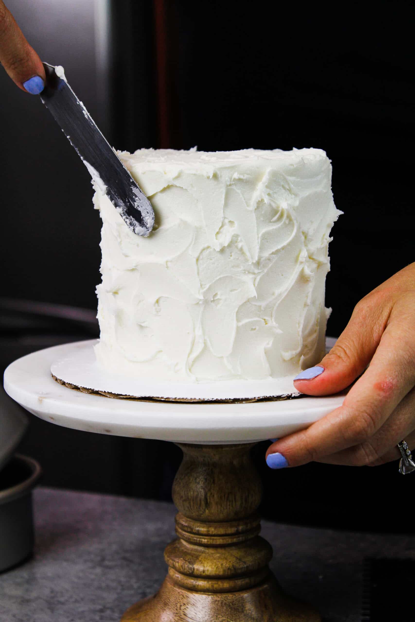 image of small cake with textured frosting sides to create a rustic look