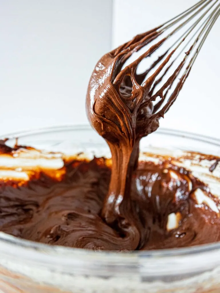image of thick brownie cookie batter that's ready to be scooped and baked