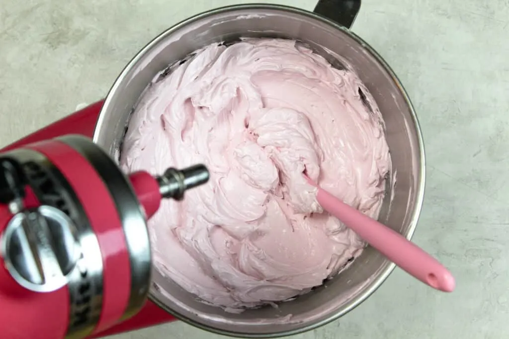 image of swiss meringue buttercream made in a pink kitchenaid