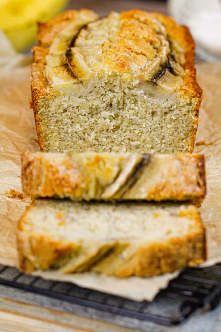 image of moist classic banana bread, sliced and ready to be eaten