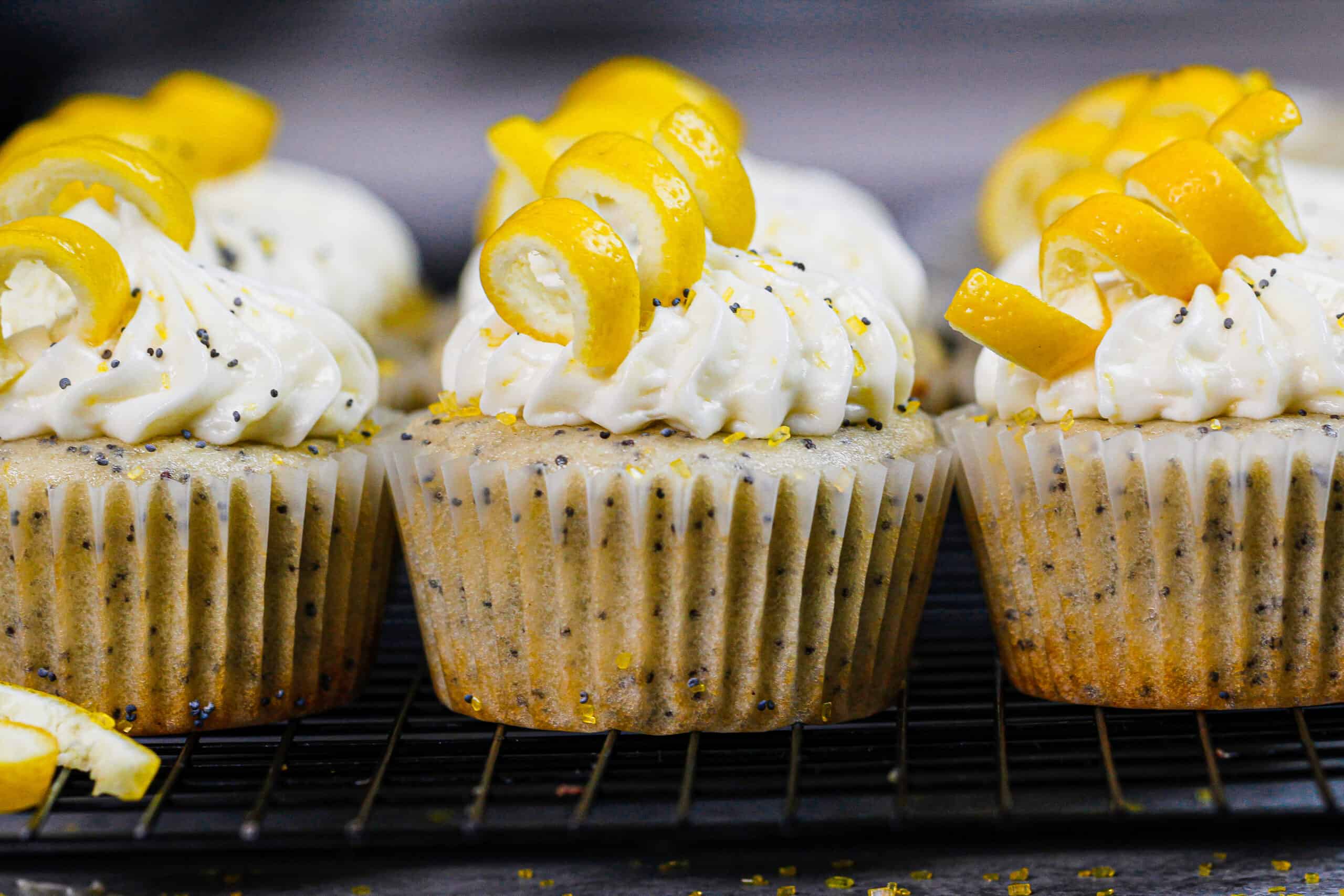 image of lemon poppy seed cupcakes decorated with cream cheese frosting