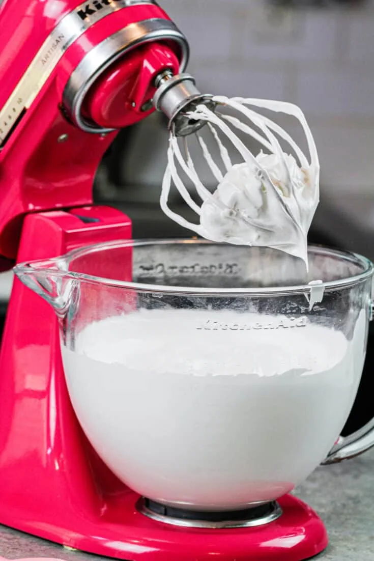 image of sugar free swiss meringue buttercream frosting being made in a kitchen aid mixer