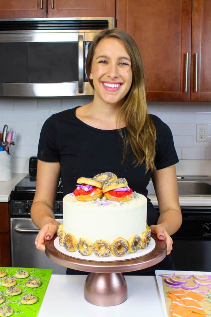 image of chelsey white of chelsweets with a bagel cake inspired by her favorite bagel and lox sandwich