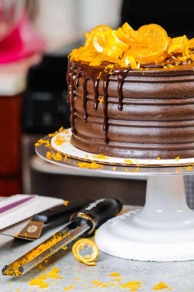 image of orange chocolate cake decorated with a chocolate drip