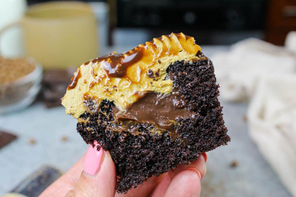 image of a mocha cupcake that's been cut open to show its espresso ganache filling