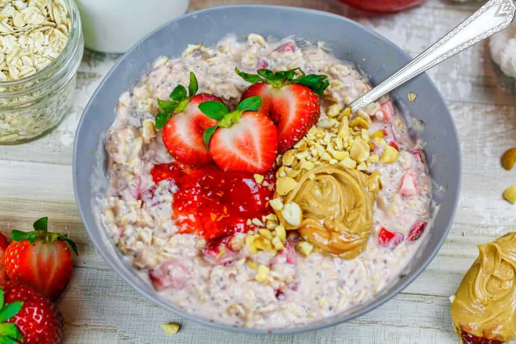 image of toppings added to peanut butter and jelly overnight oats