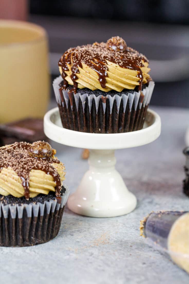 image of mocha cupcakes frosted with espresso buttercream frosting and drizzled with espresso ganache