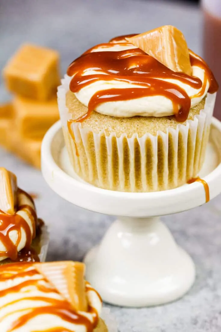 image of caramel cupcakes filled with chewy caramel and topped with a caramel drizzle