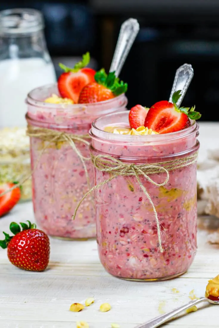 image of peanut butter and jelly overnight oats made in cute mason jars