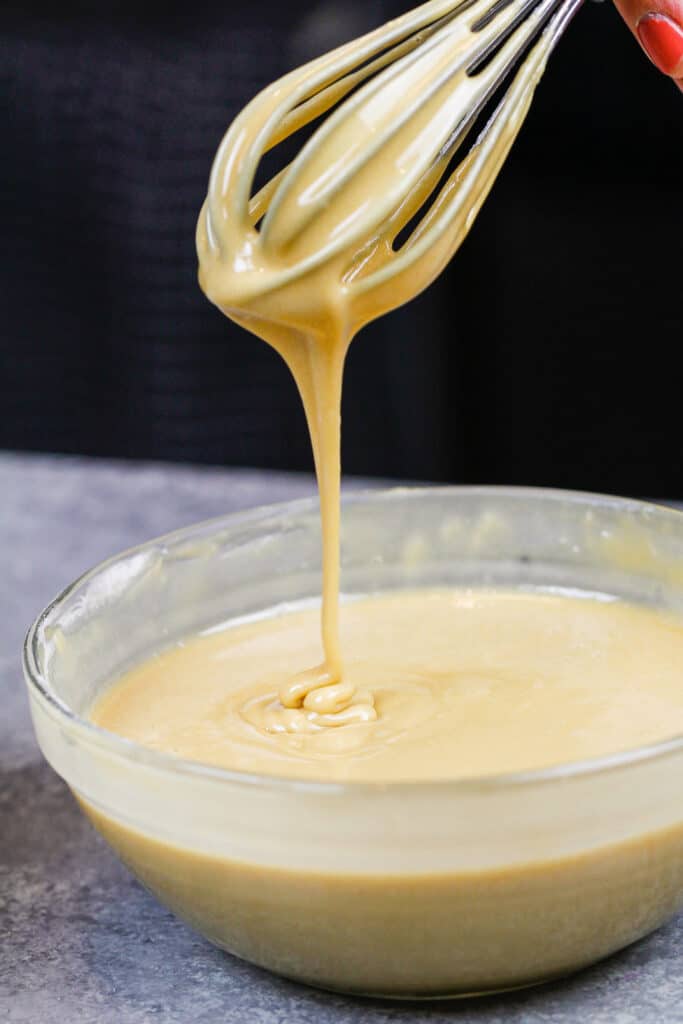 image of maple glaze on a whisk