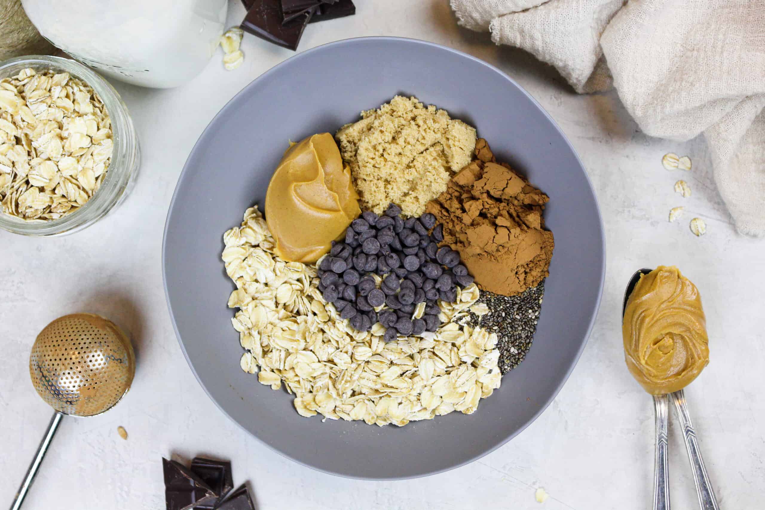 image of ingredients in a bowl to make chocolate overnight oats