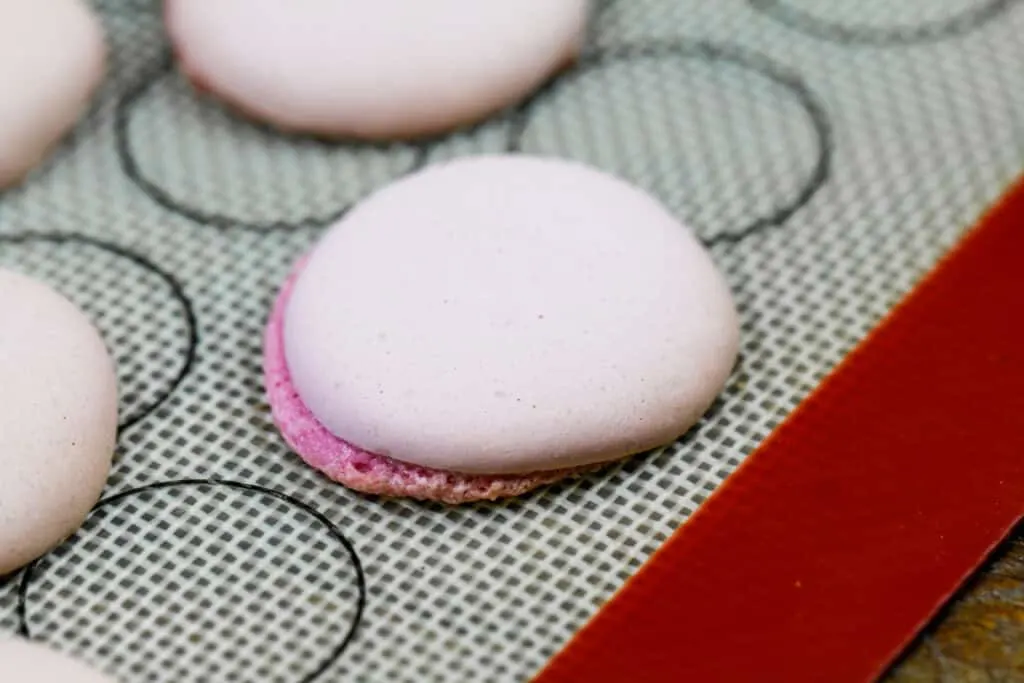 image of a lopsided macaron with an uneven foot