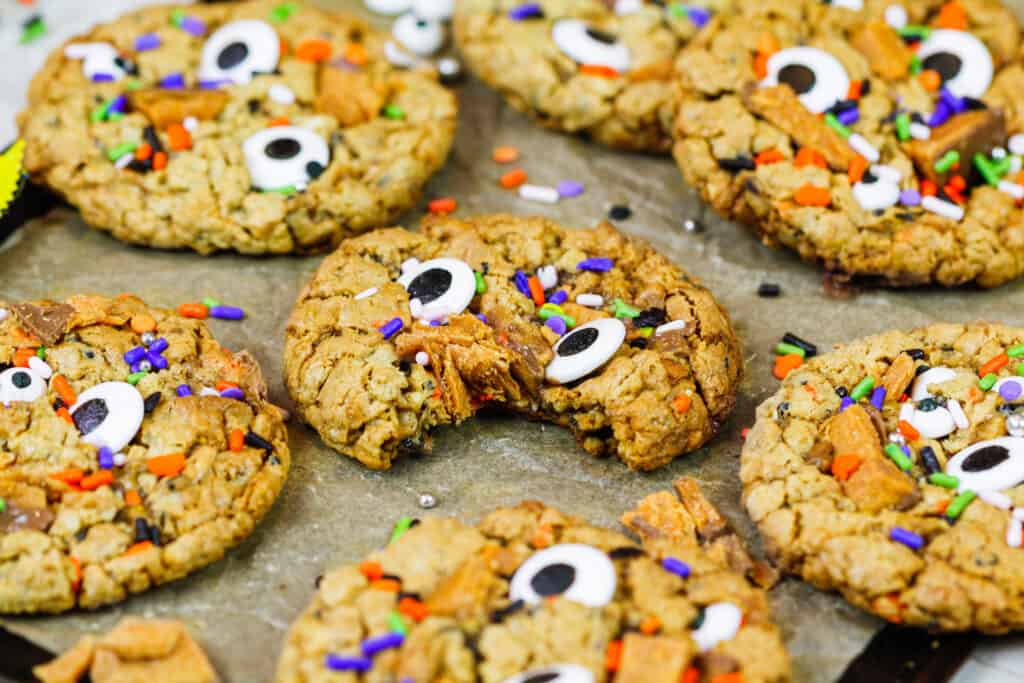 image of monster peanut butter cookies made with butterfinger and candy eyes