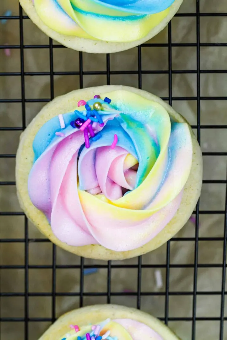 image of buttercream cookie decorated with unicorn inspired pastel buttercream frosting