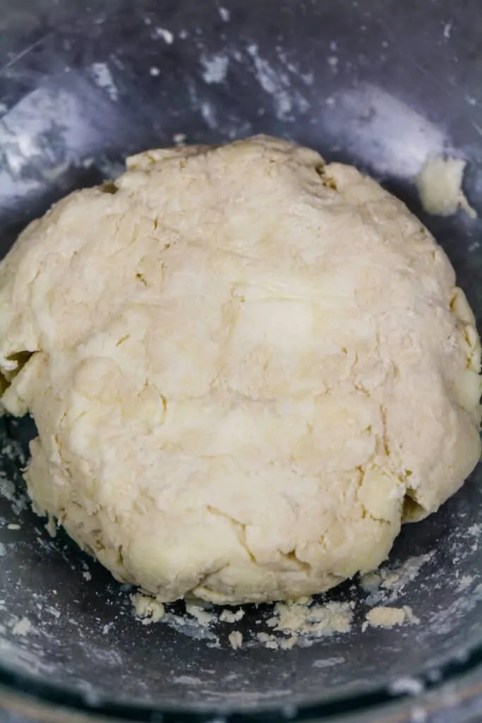 image of an all butter pie crust made with big chunks of butter to create a flaky crusts
