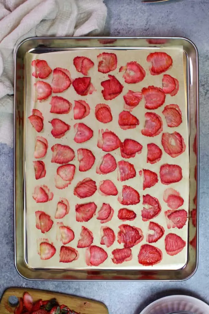 image of oven-dried strawberries on a baking pan