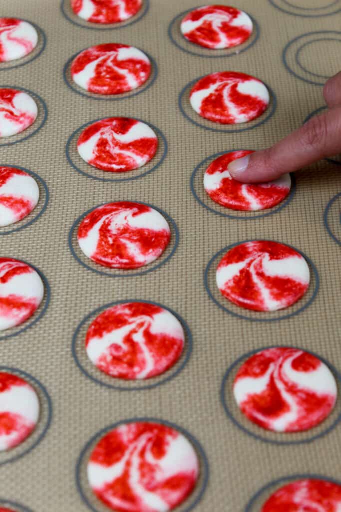 image of rested peppermint macaron shells that are ready to be baked