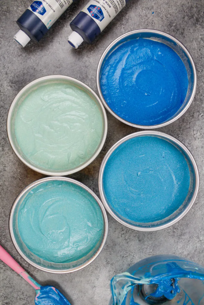 image of ombre blue cake layers ready to be baked