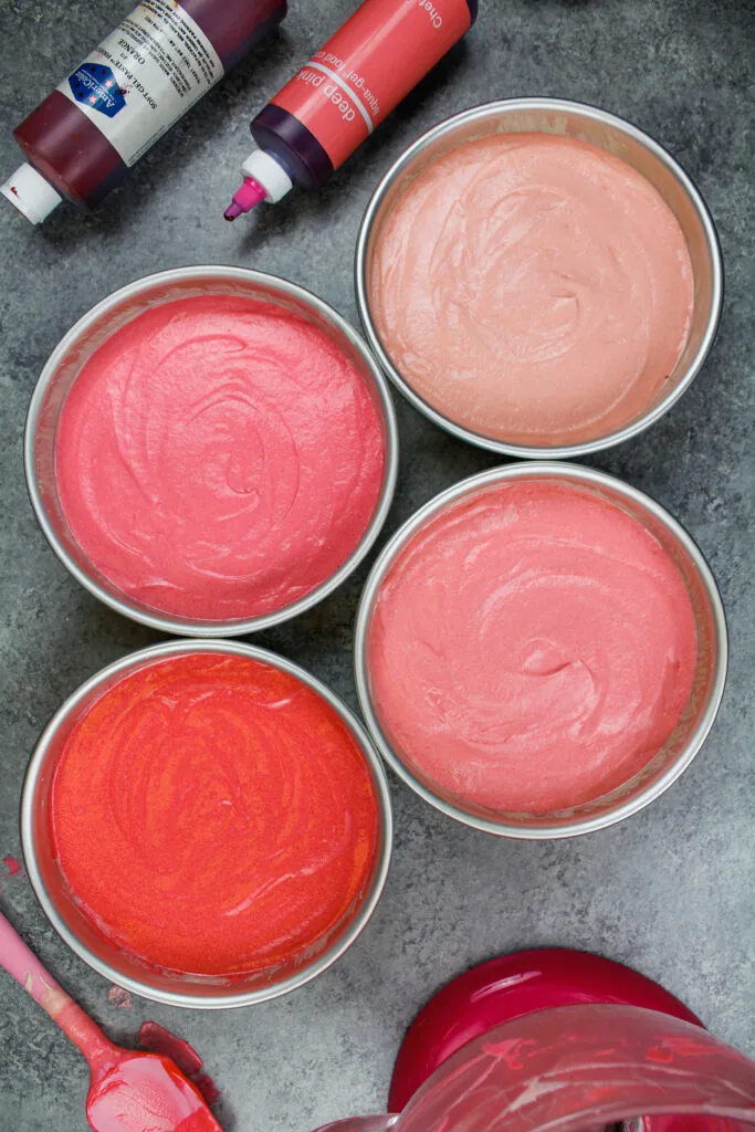 image of ombre pink cake layers ready to be baked