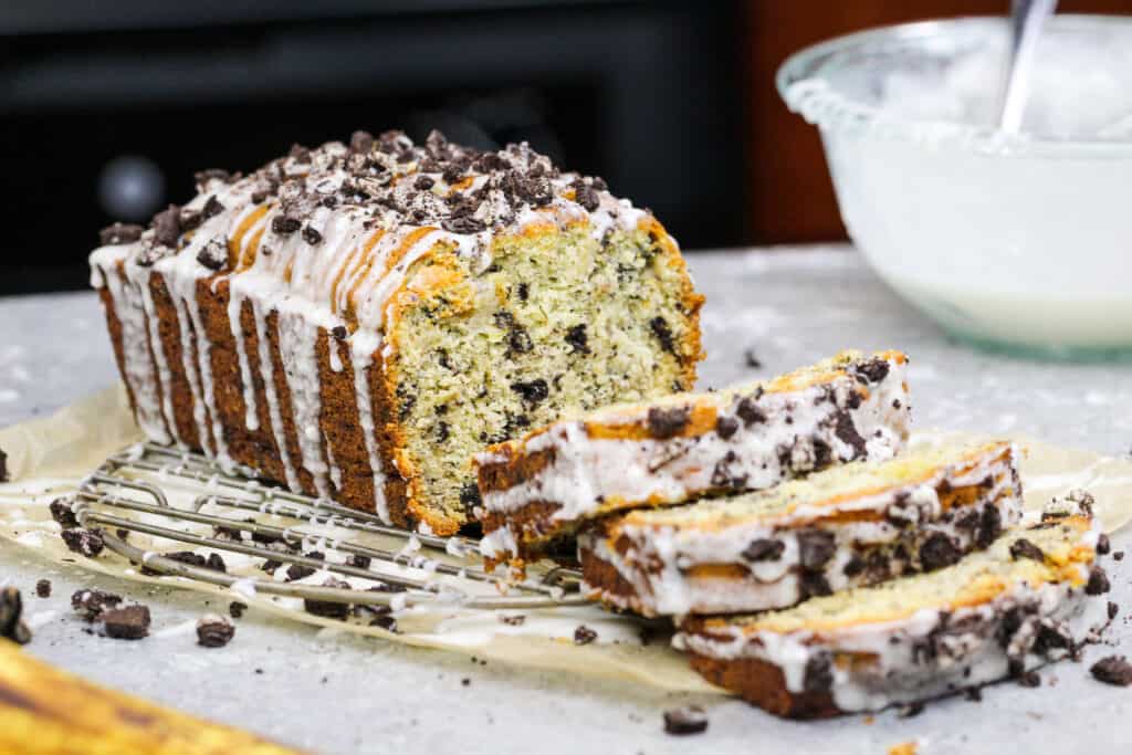 image of oreo banana bread that's been cut into to show how tender its texture is