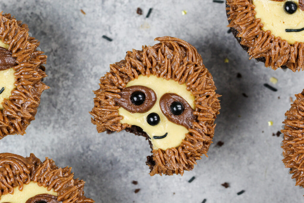 image of a sloth cupcake that's been bitten into