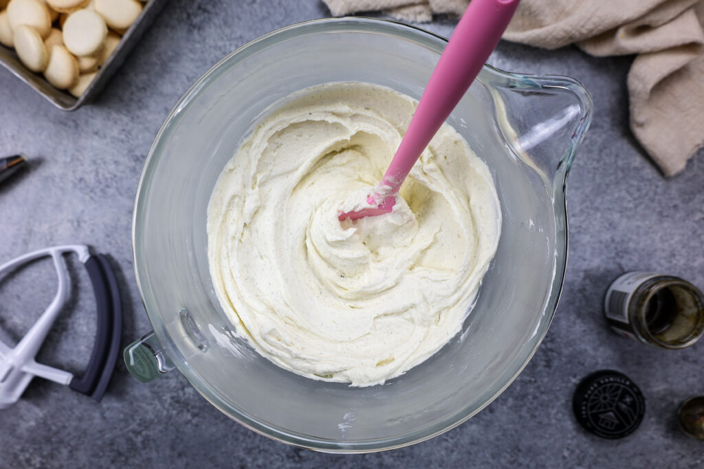 image of vanilla bean buttercream that's been mixed in a kitchen aid bowl