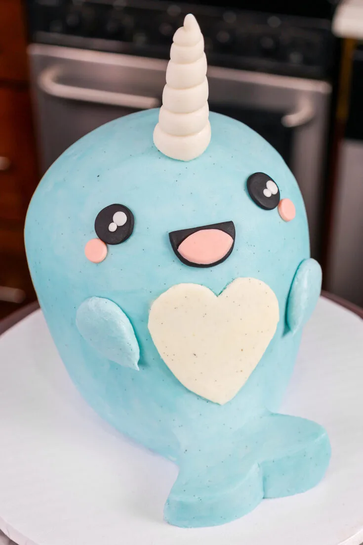 image of an adorable narwhal cake made with buttercream
