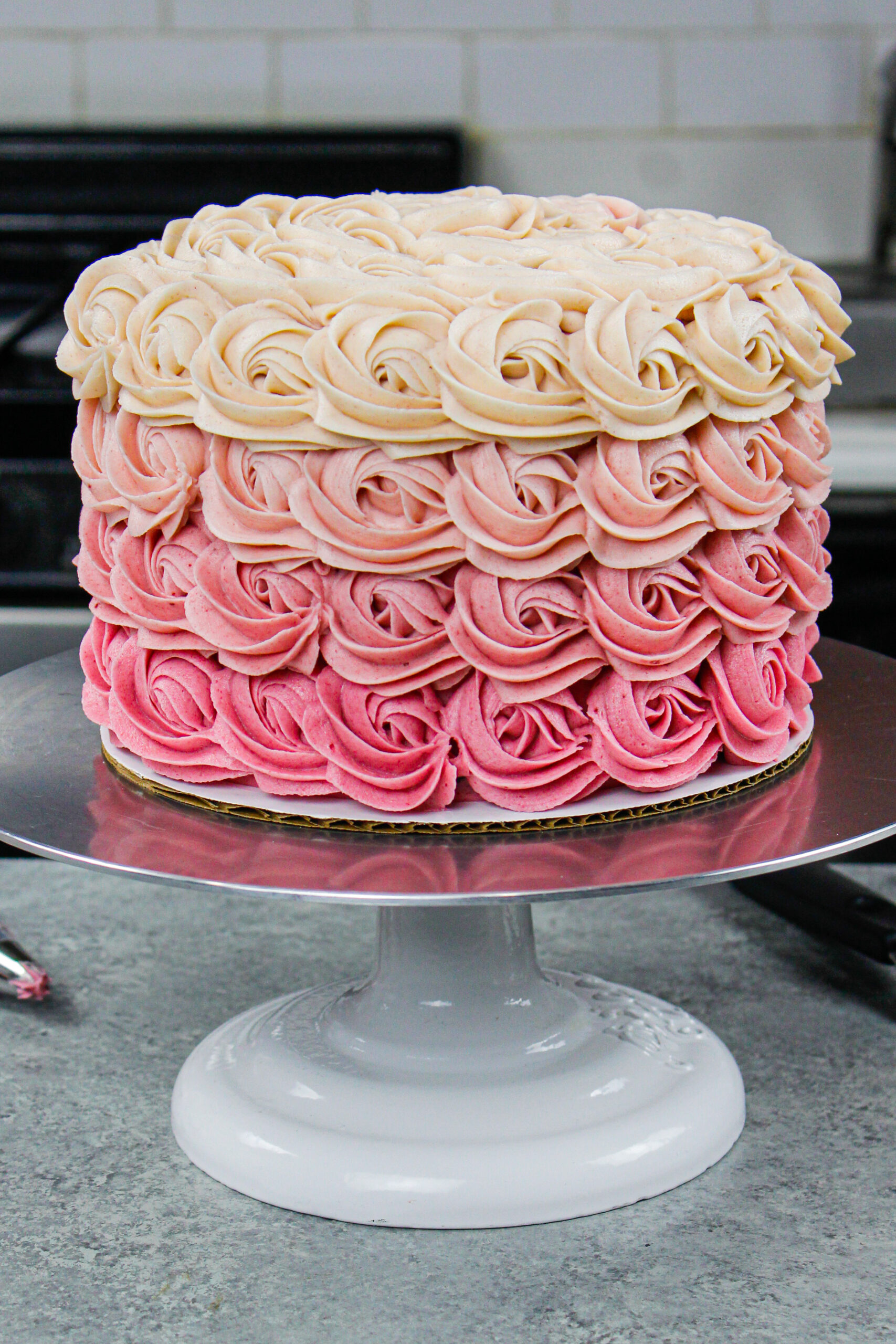 image of a gorgeous pink ombre rosette cake made with a wilton 1m open star frosting tip