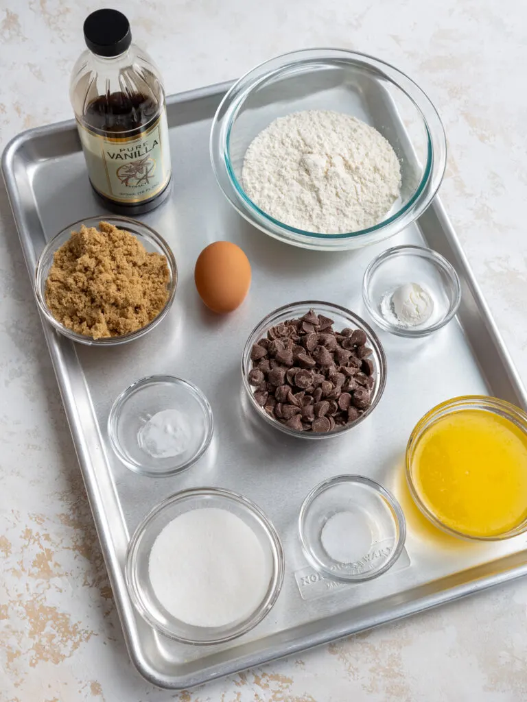 image of ingredients laid out on a tray to make no chill chocolate chip cookies