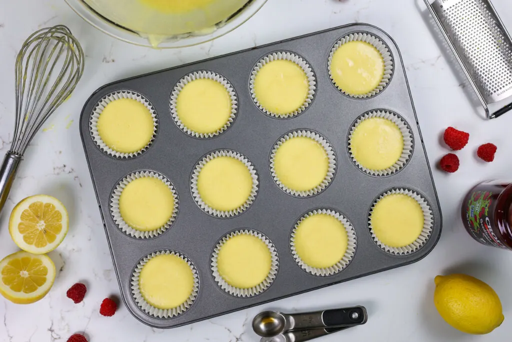 image of lemon cupcakes ready to be baked to make raspberry lemonade cupcakes