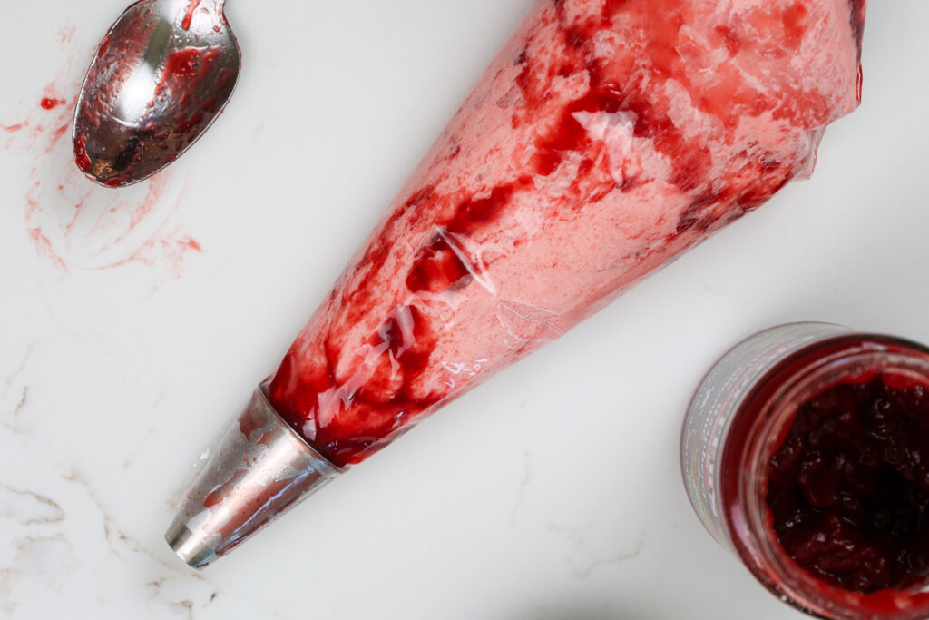 image of raspberry buttercream made with raspberry jam