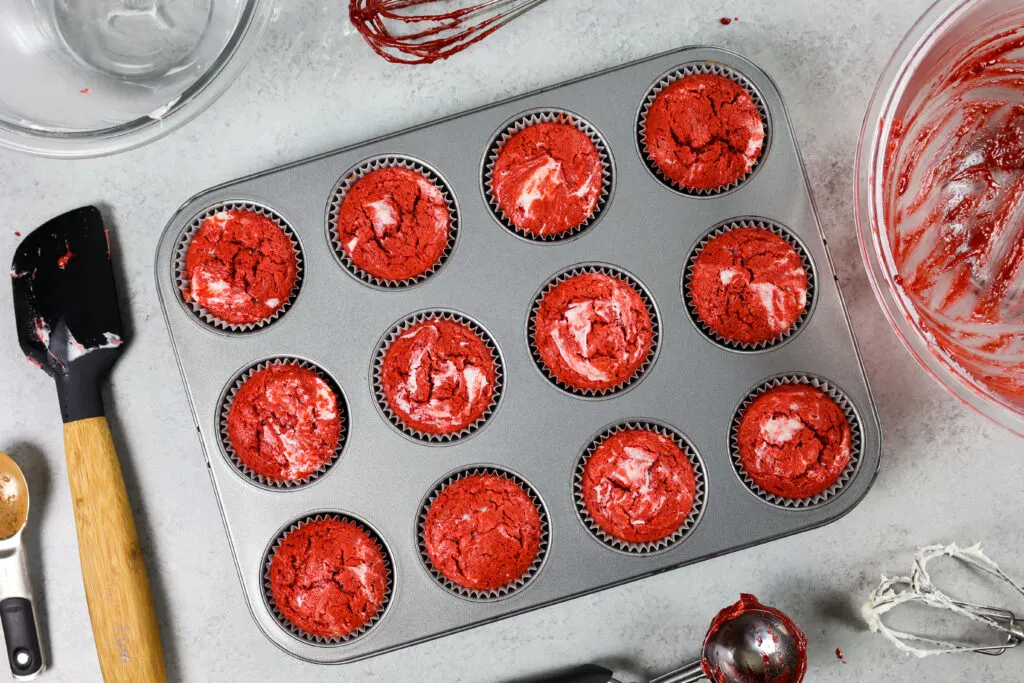image of red velvet muffins marbled with a cream cheese filling