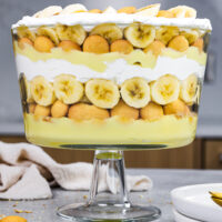 image of banana pudding trifle that's been layered in an 8 inch trifle dish
